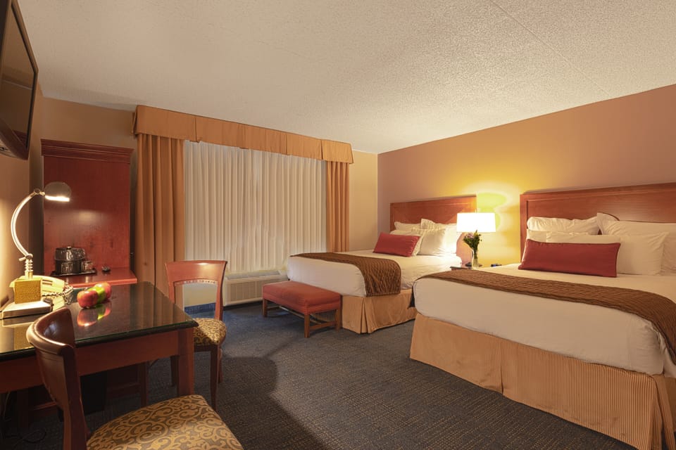 Deluxe Room (Coast Two Queens) | Premium bedding, desk, blackout drapes, iron/ironing board
