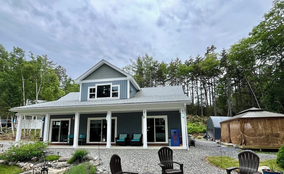 Front view of home, gardens, and gazebo. 