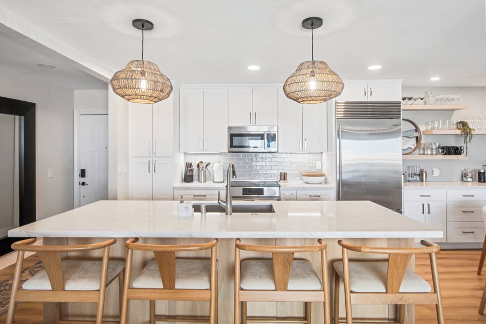 Seating for 4 at the bar overlooking the stunning new kitchen.