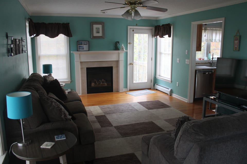 Living room with door to deck