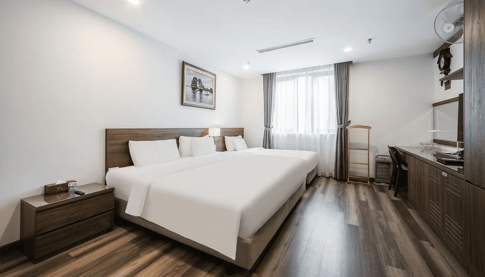 Family Room | Minibar, in-room safe, blackout drapes, iron/ironing board