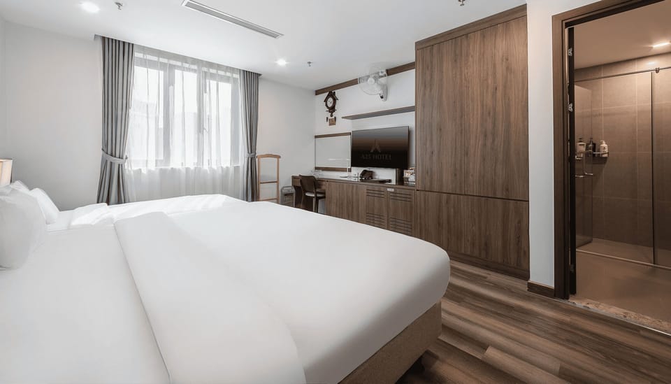 Family Room | Minibar, in-room safe, blackout drapes, iron/ironing board