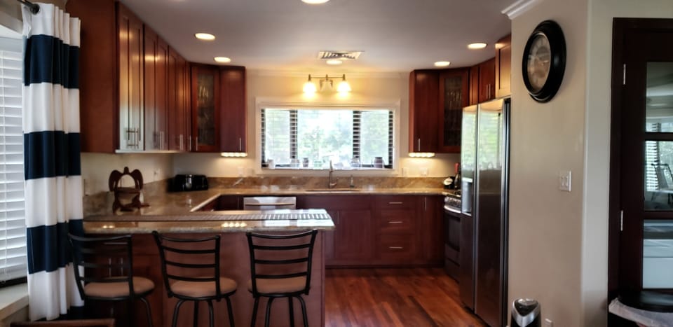 Chef 's gourmet Kitchen wl granite countertops and stainless steel appliances