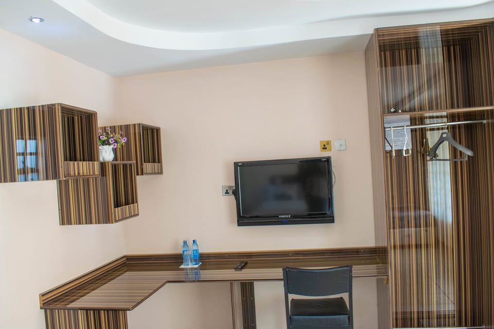 Luxury Double Room | Desk, blackout drapes, iron/ironing board, free WiFi