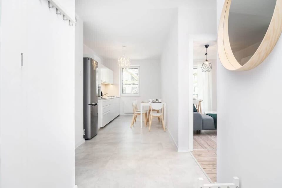 View from the hallway with round mirror.