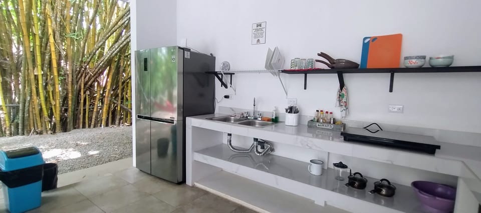 Shared fridge, stovetop, cookware/dishes/utensils, cleaning supplies