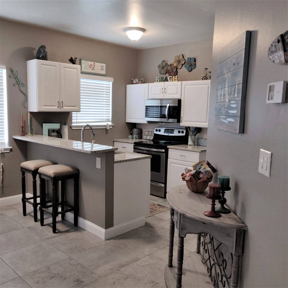 Breakfast bar and kitchen where you will find everything you need!