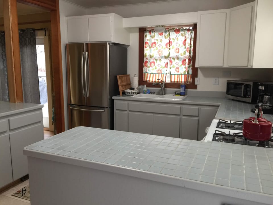 New stainless refrigerator, dishwasher and microwave
