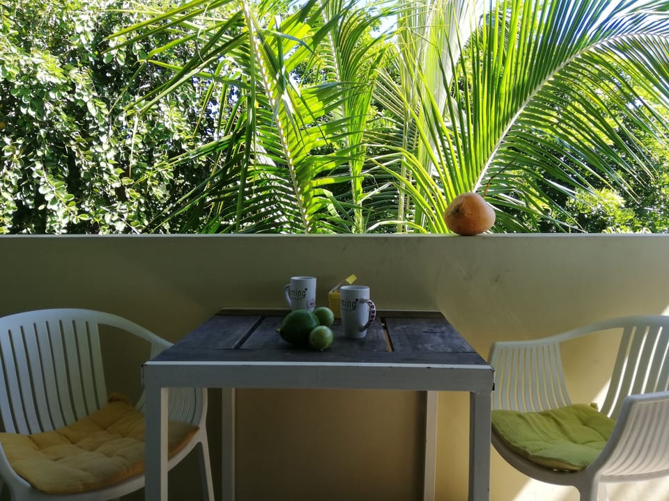 Morning coffee on your private dining terrace in a tropical paradise
