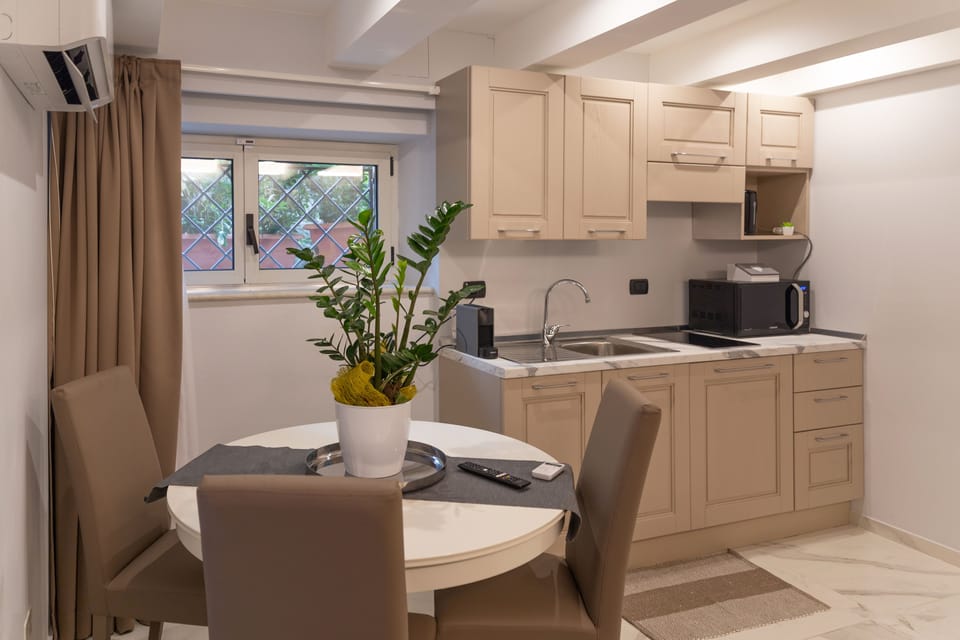 Apartment, 1 Bedroom (Volare) | Private kitchen | Full-size fridge, microwave, stovetop, espresso maker