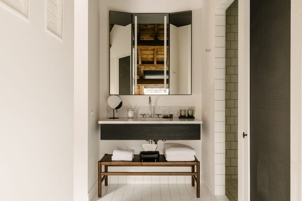 Designer toiletries, hair dryer, bathrobes, slippers
