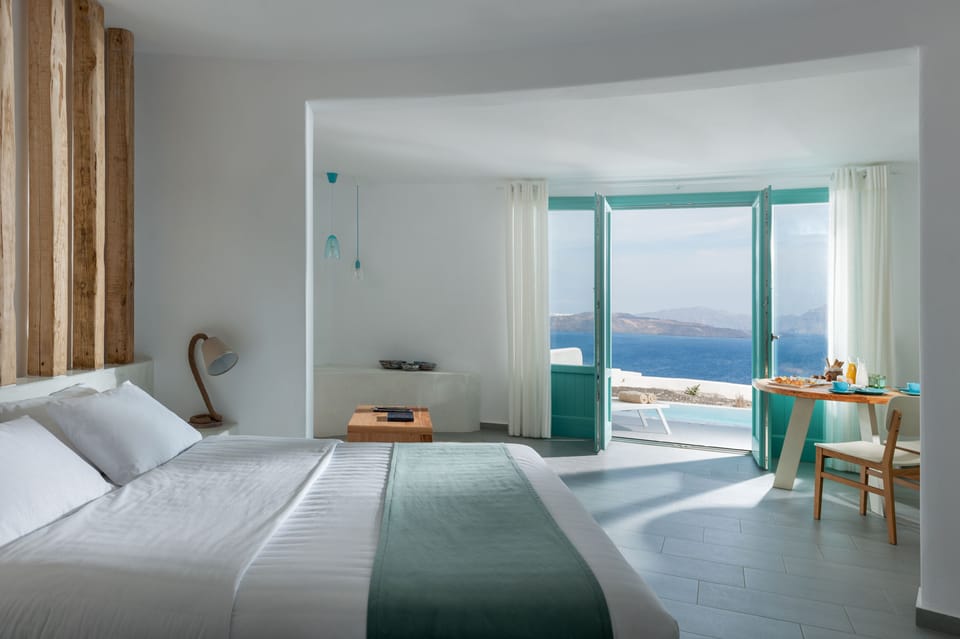 Grand Suite with Private Heated Pool Caldera View | In-room safe, desk, blackout drapes, soundproofing