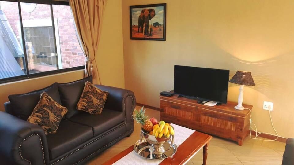 Family Apartment (Premium) | Living area | 70-cm TV with satellite channels