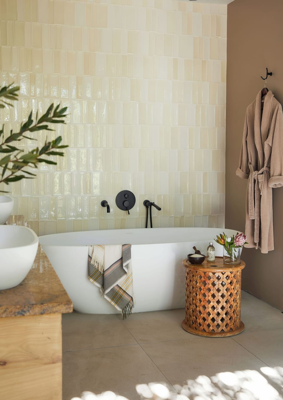 Separate tub and shower, hair dryer, slippers, towels