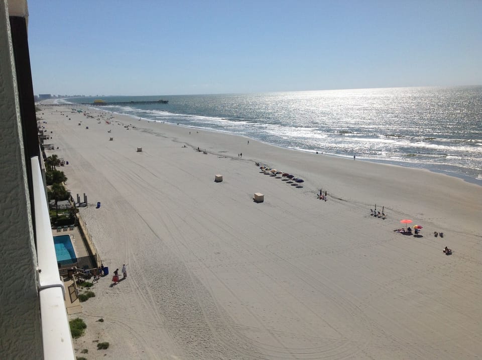 Beach north view from patio - Apache Pier within walking distance 