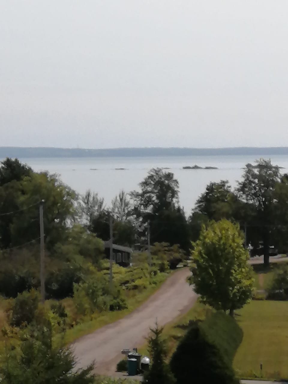 On a quiet country lane. House is on the left.