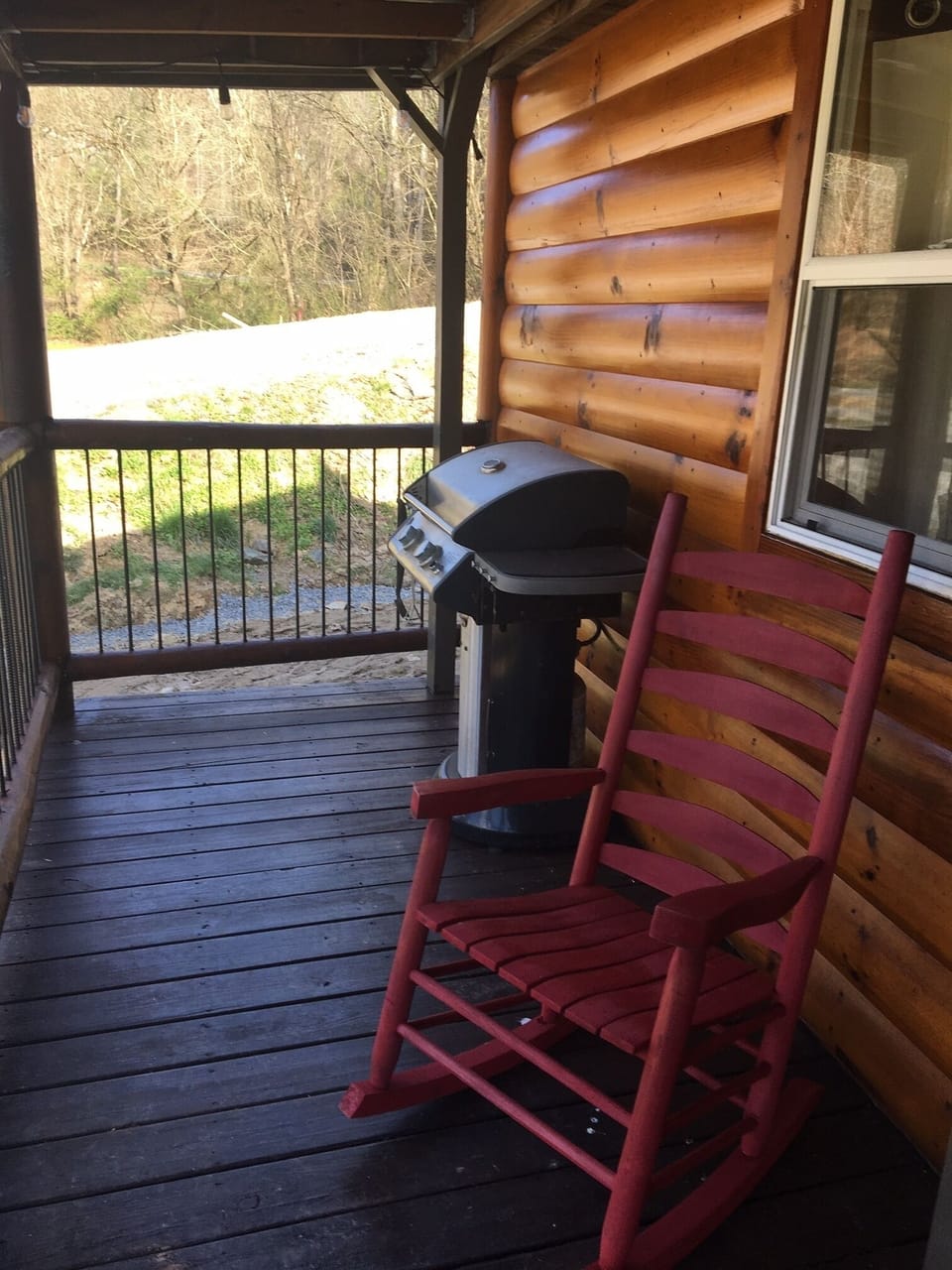 Propane gas BBQ grill on front porch. Be sure to check propane before grilling.