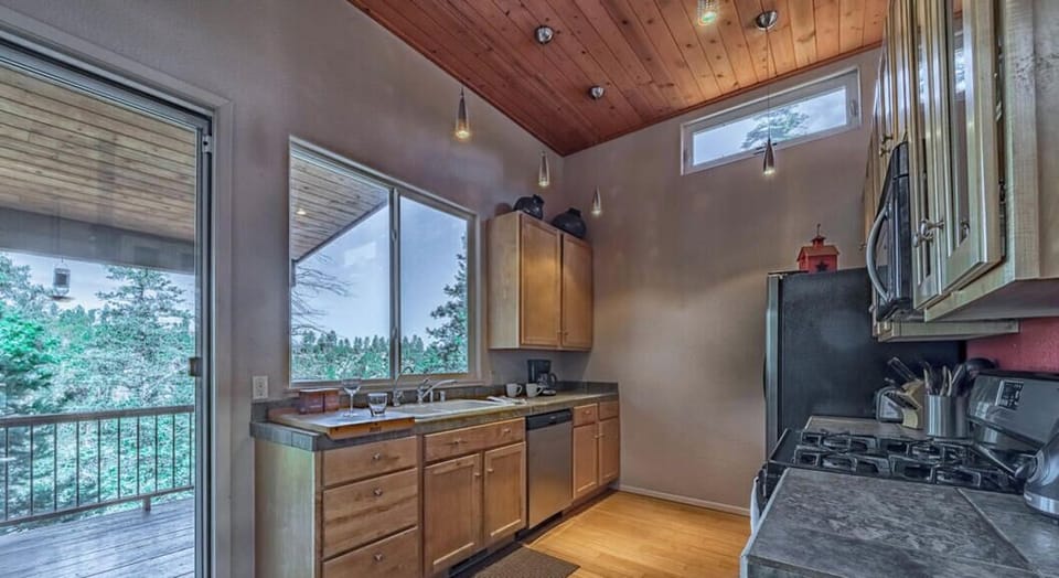 Modern, cozy kitchen with a "to die for" view of the mountains! (Main level)