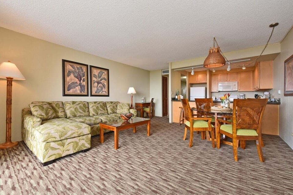 Relax in the inviting living room, complete with a comfortable L-shape sleeper sofa
