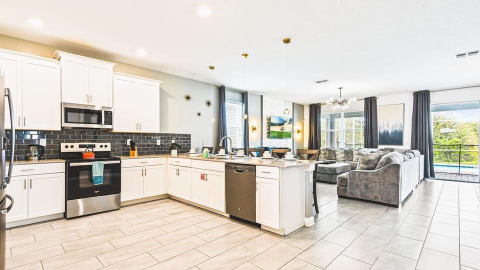 Culinary space featuring a breakfast bar for convenient dining