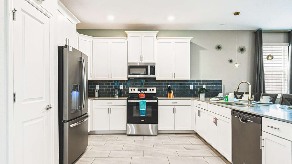 Culinary space featuring a breakfast bar for convenient dining
