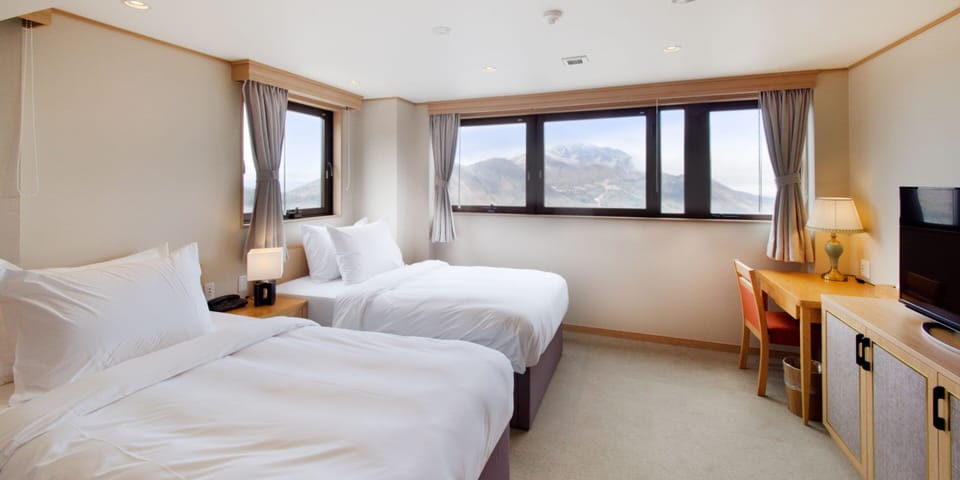 Premium bedding, down comforters, memory foam beds, in-room safe