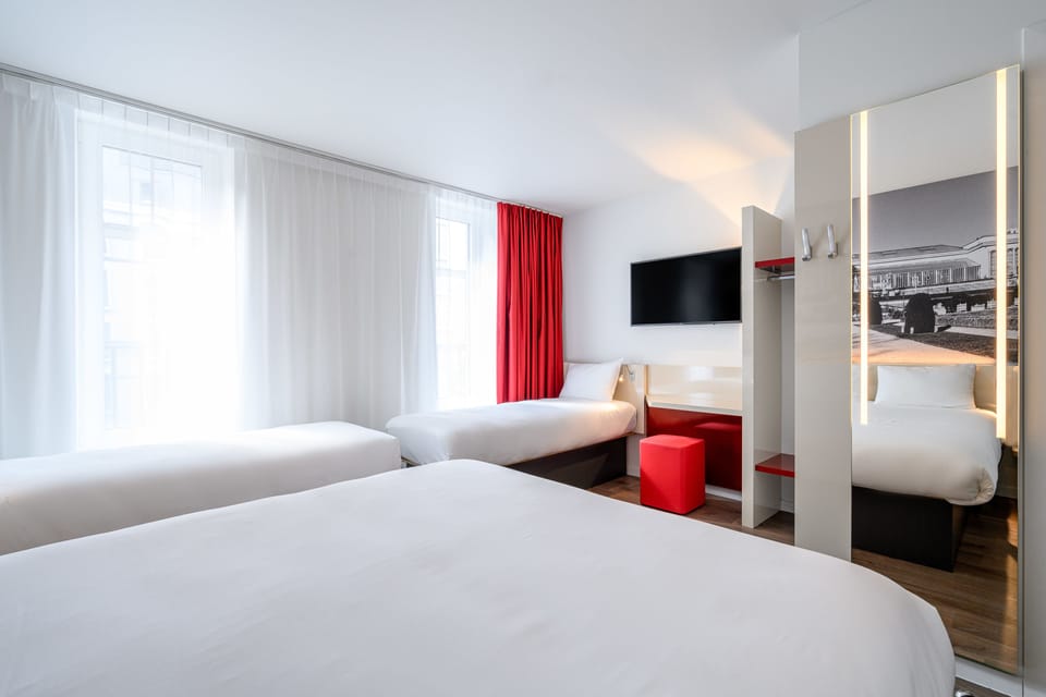 Classic Quadruple Room | Individually decorated, desk, laptop workspace, blackout drapes