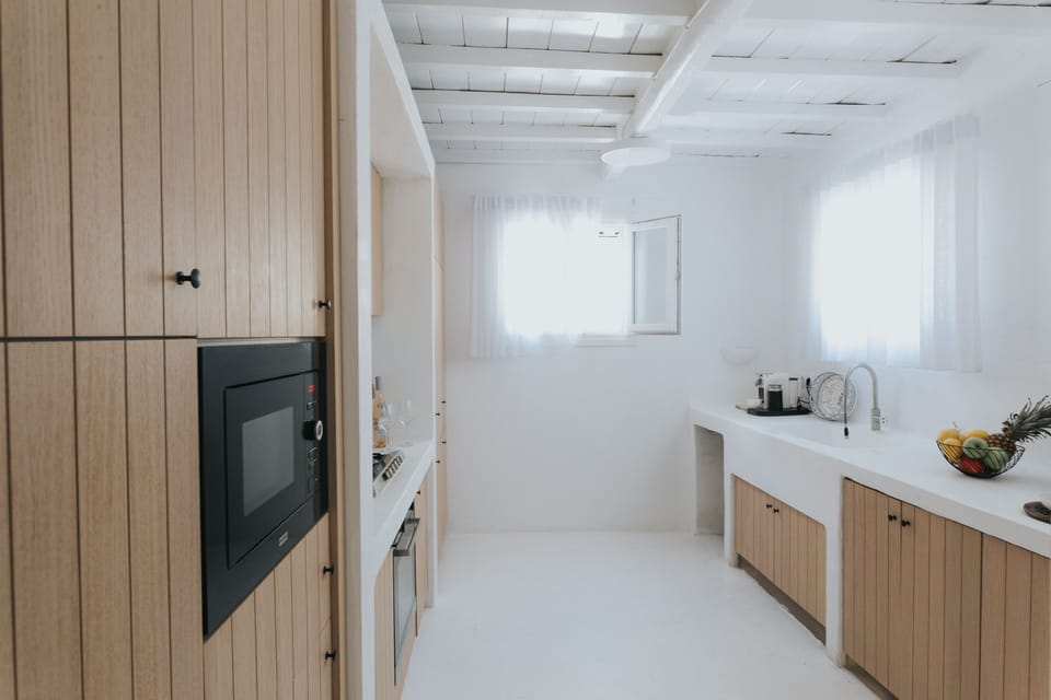 Deluxe Beach Front Villa, With Pool | Private kitchen | Fridge, microwave, oven, stovetop