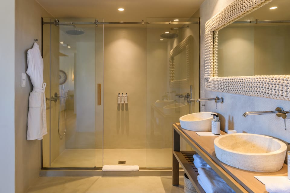 Shower, rainfall showerhead, designer toiletries, hair dryer