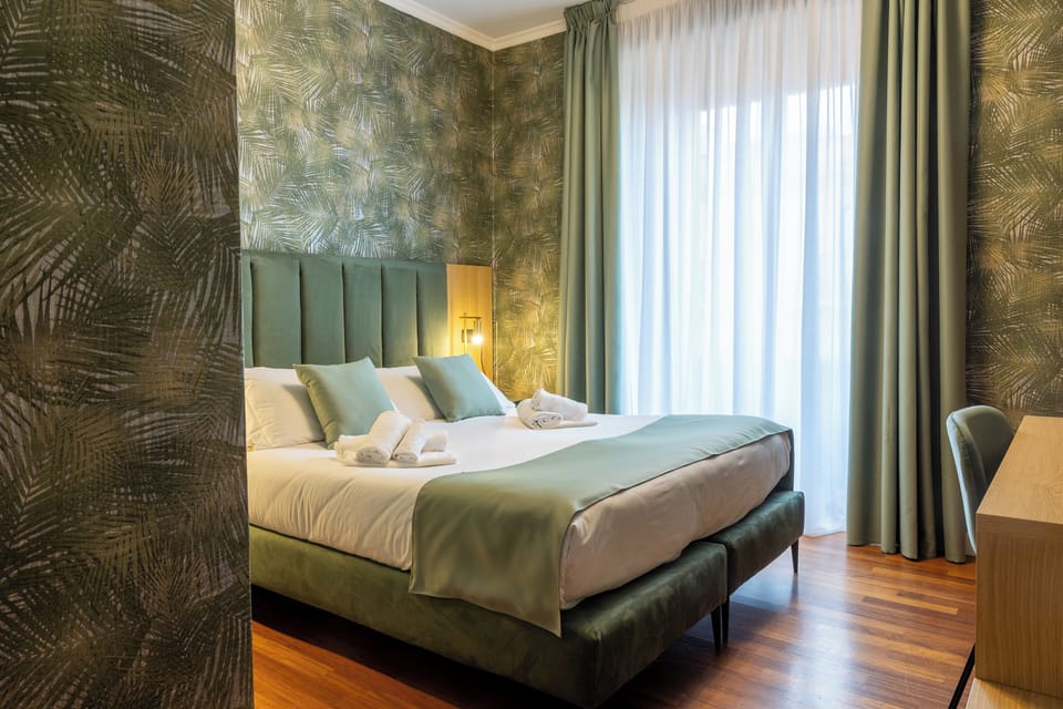 Superior Room | Down comforters, in-room safe, individually decorated, desk