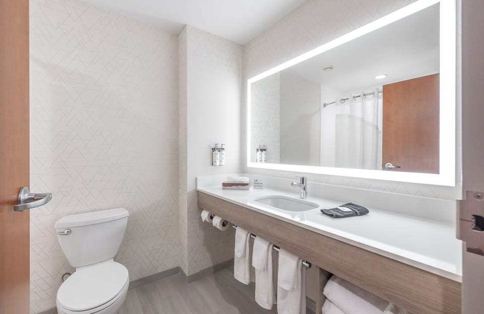 Hair dryer, towels, soap, shampoo