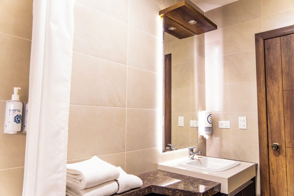 Standard Double Room, Non Smoking, Courtyard View | Bathroom | Shower, rainfall showerhead, free toiletries, hair dryer (on request)