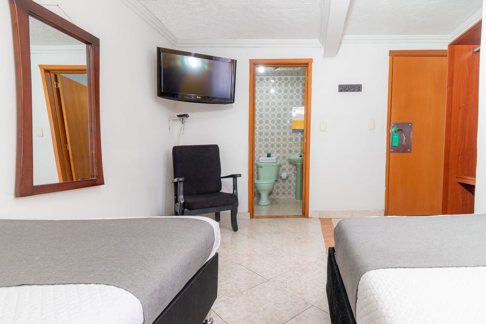 Family Triple Room | Soundproofing, iron/ironing board, free WiFi, bed sheets