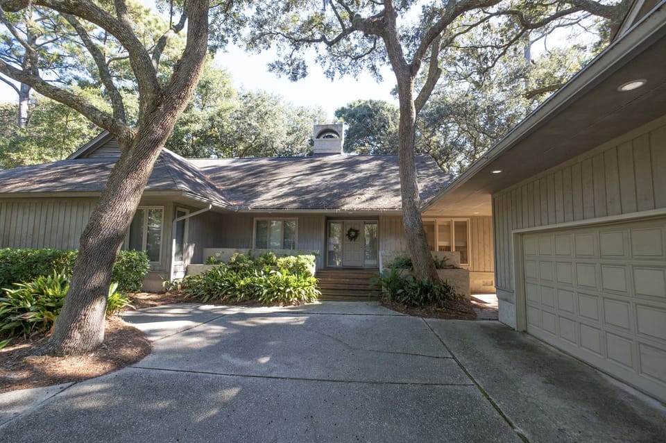 Driveway  and large fully stocked garage