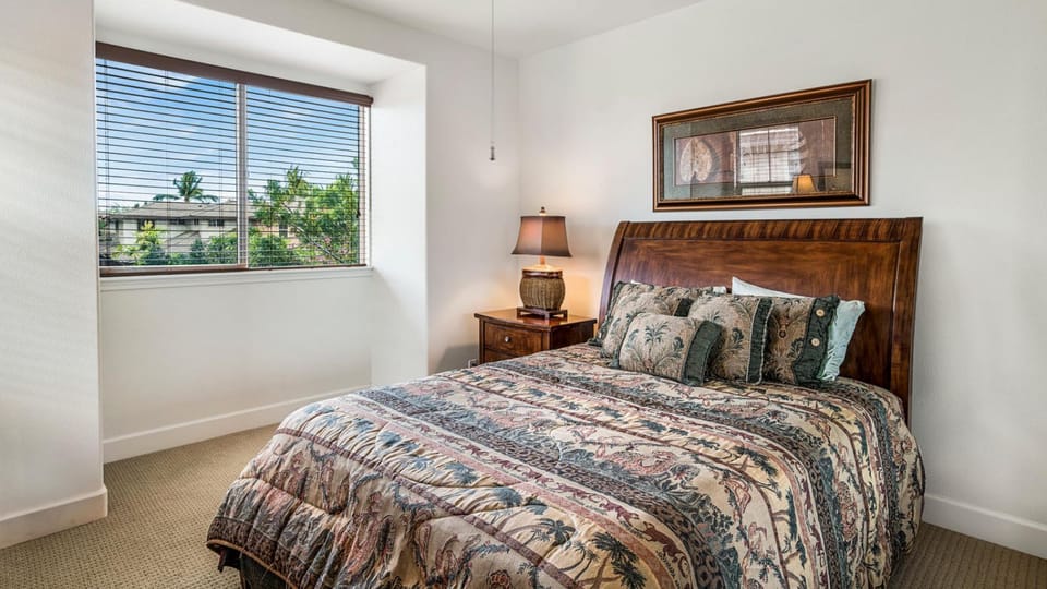 Bedroom with Large Bed and Ceiling Fan