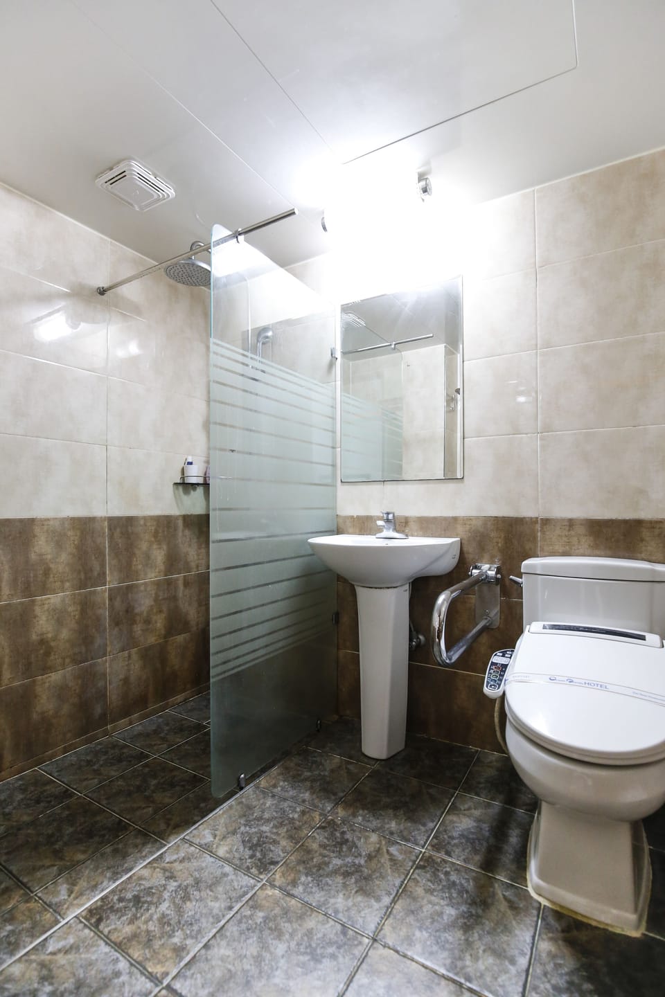 Shower, eco-friendly toiletries, hair dryer, slippers