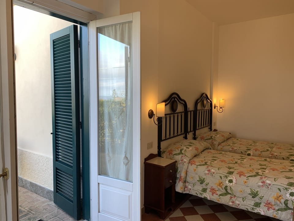 Deluxe Double Room, Patio, Sea View | Premium bedding, down comforters, memory foam beds, minibar