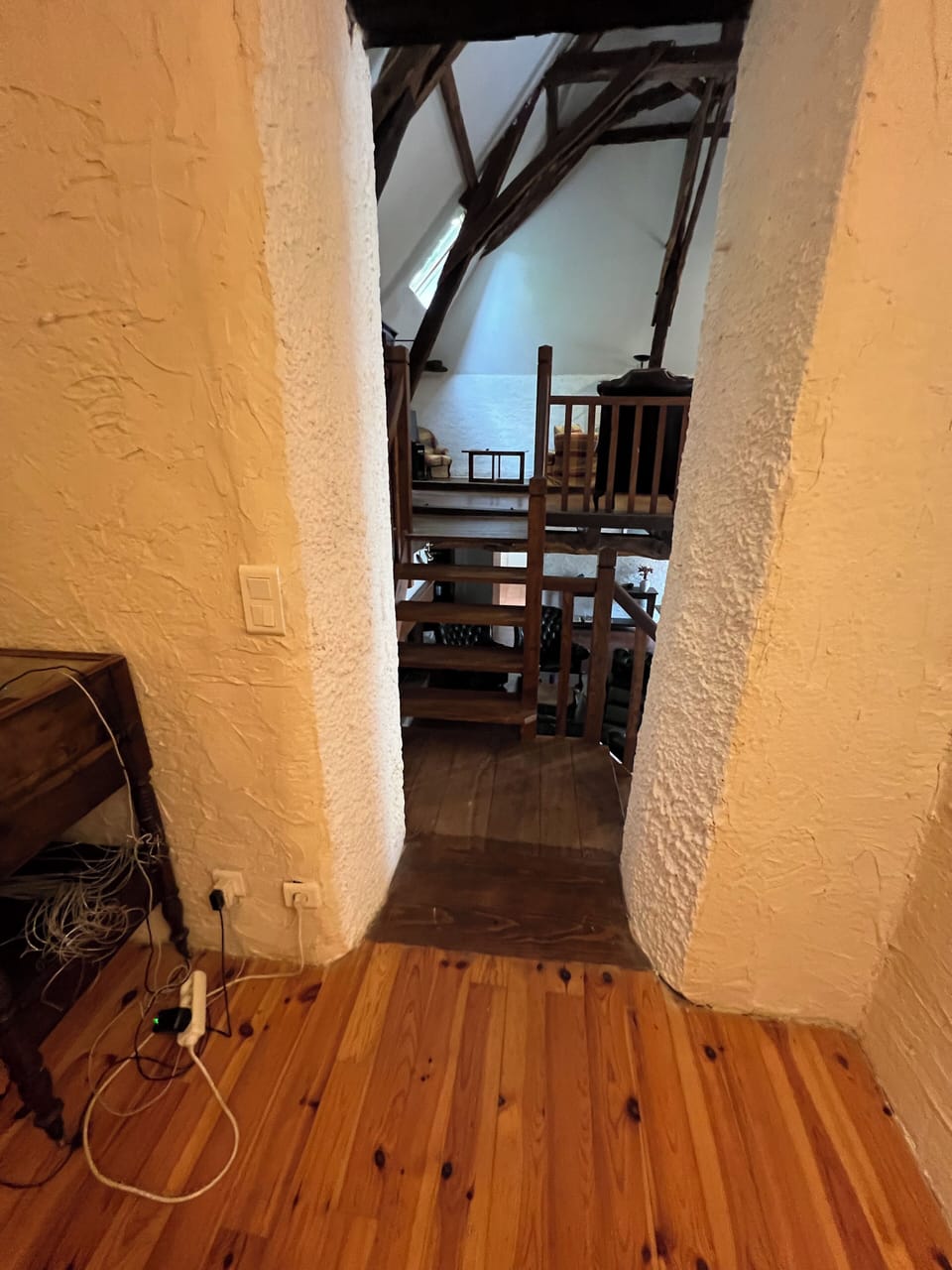 Access from top of the stairs to main bathroom and bedrooms