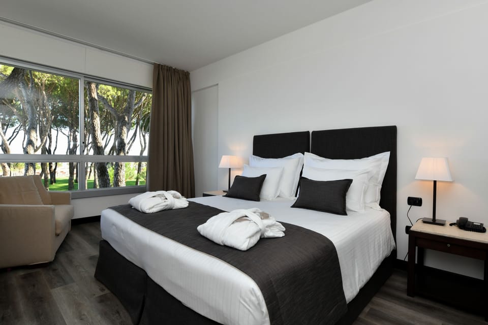 Premium bedding, down comforters, memory foam beds, minibar