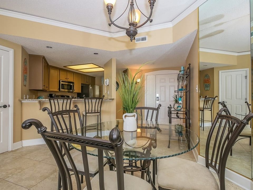 Dining Area and Kitchen with Breakfast Bar at 3403 Windsor Court South