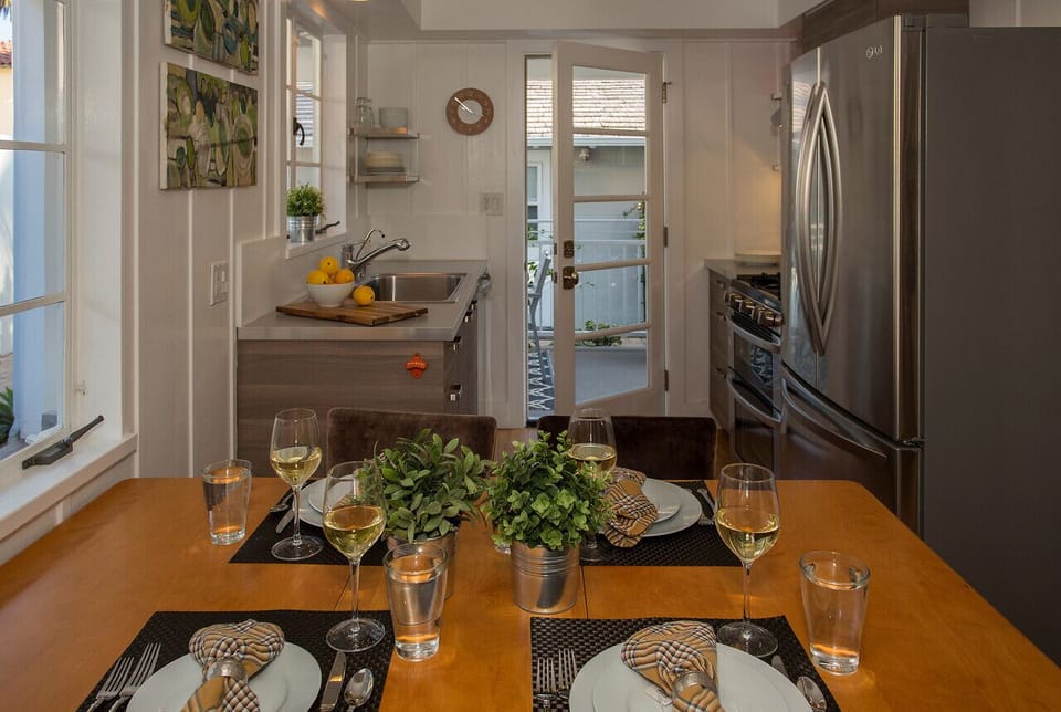 Door leads to rear dining patio and grill