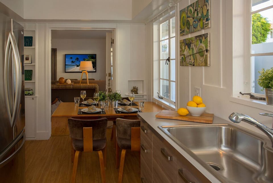 Louvered French doors can close off Kitchen for privacy