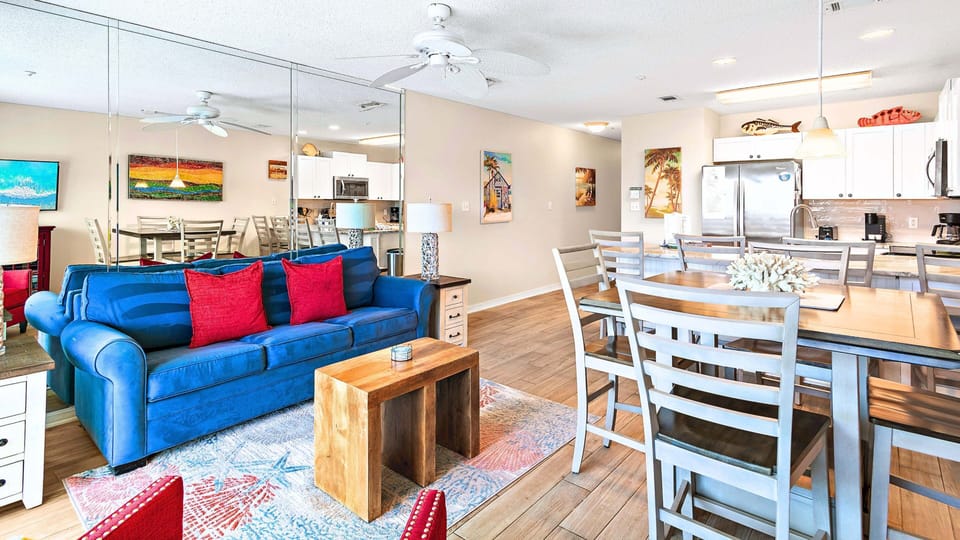 Sink into the sofa in this cheerful, light-filled space.