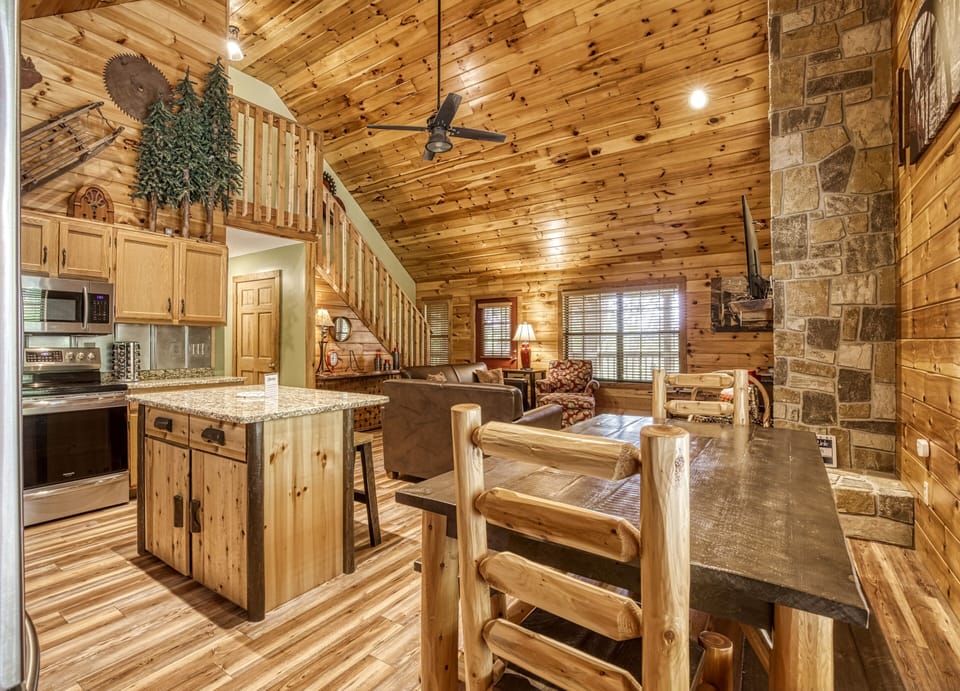 Affordable Pigeon Forge Chalet - "S'more Family Fun" - Dining area and living room