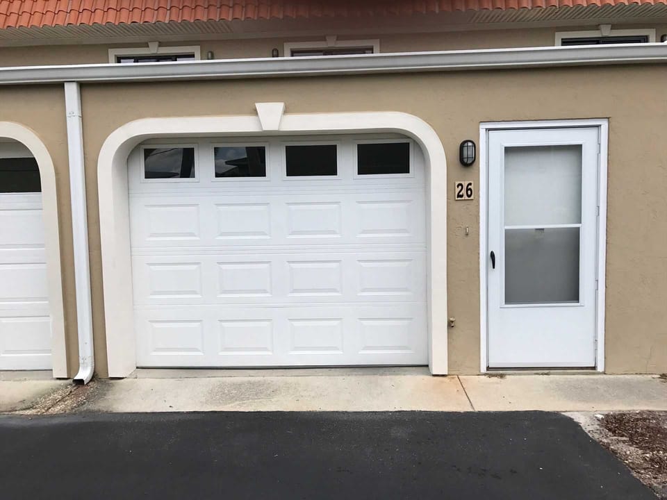 Front entrance through garage