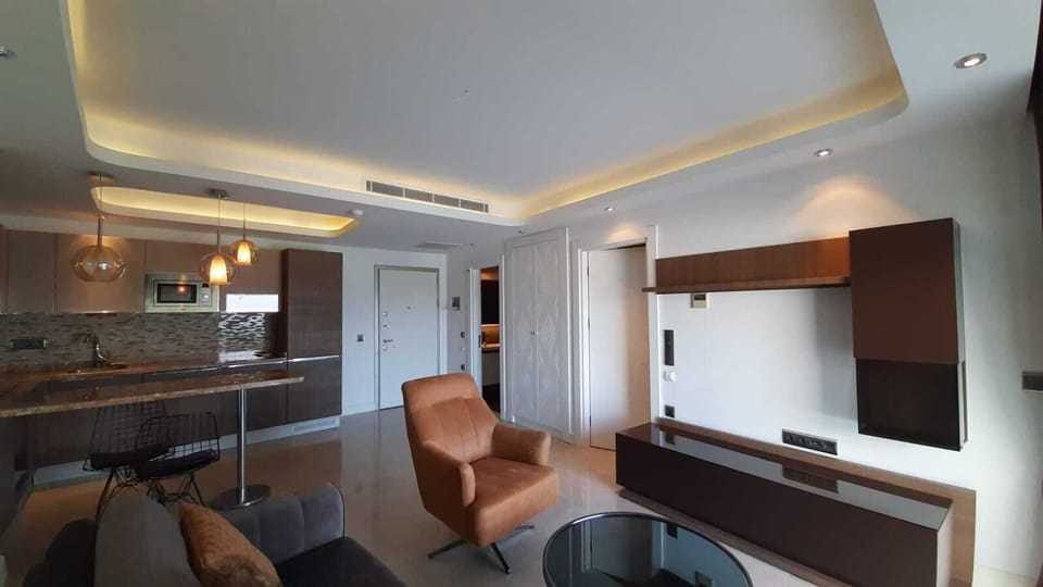Exclusive Apartment, 2 Bedrooms, Non Smoking, Sea View | Living area | 32-inch LCD TV with premium channels, TV