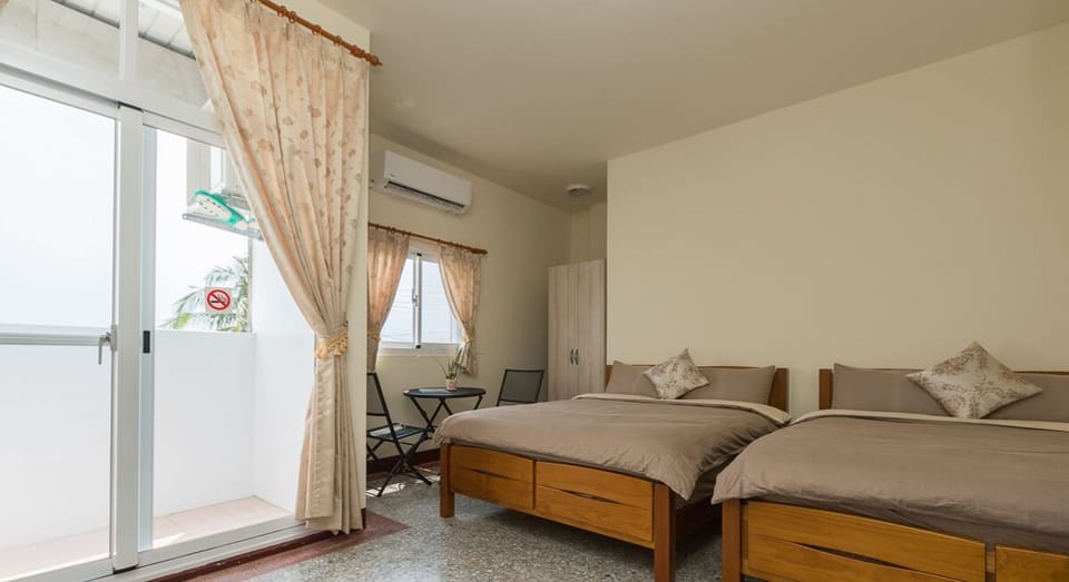 Premium Quadruple Room, 2 Queen Beds, Sea View | Blackout drapes, soundproofing, free WiFi, bed sheets