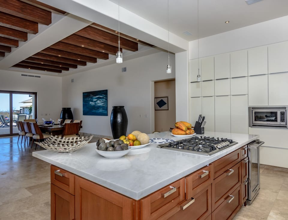 Spacious, designer chef's kitchen overlooking living/dining and ocean views.