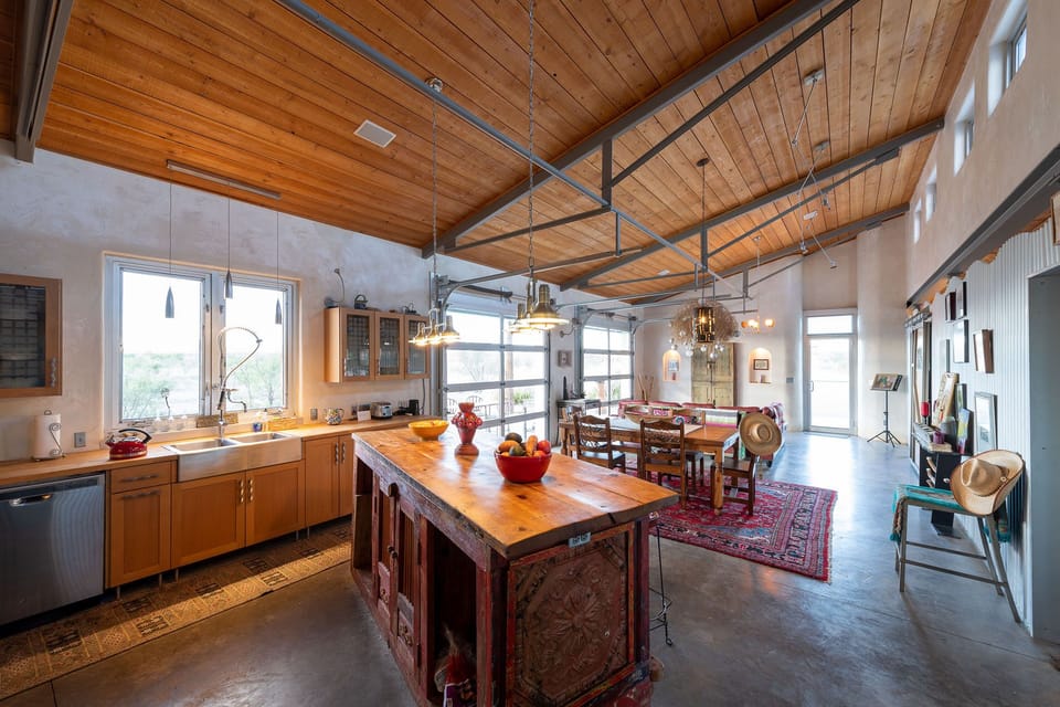 view from kitchen to dinning area and living area