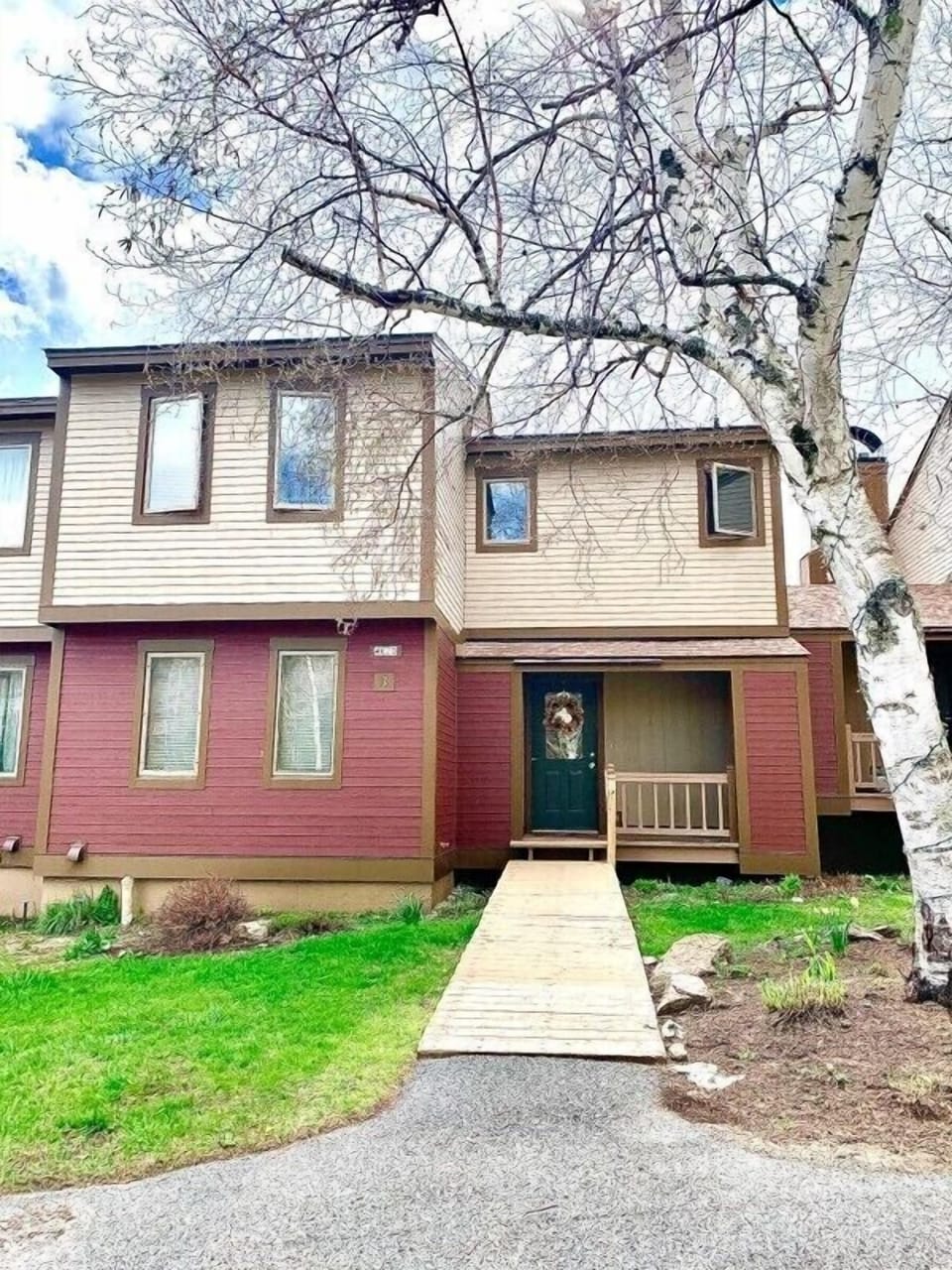 Outside view, two spot reserved for each unit